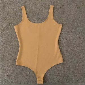 Scoop neck body suit.